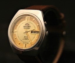 Serviced luxury gold 21 jewel Orient, all SS automatic day/date wristwatch runs! - £114.72 GBP
