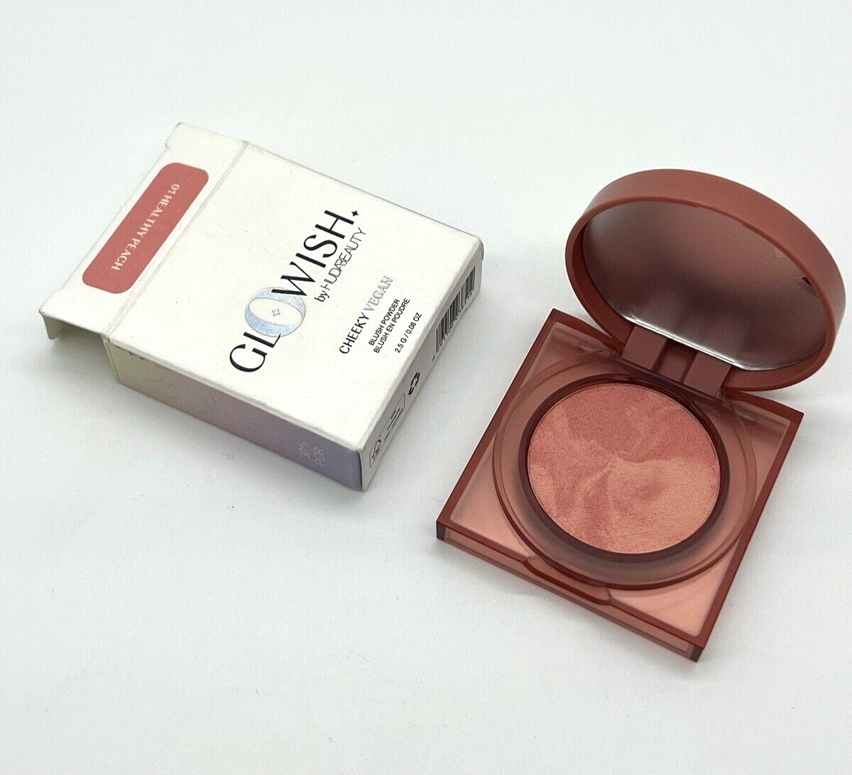 Primary image for Huda Beauty GloWish Cheeky Vegan Blush Powder 01 Healthy Peach. NIB Full Sz 2.5g