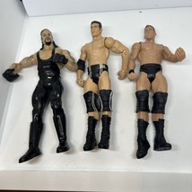 Lot of 3 WWE Wrestling Action Figures Undertaker Cody Rhodes Ted Dibiase... - £13.63 GBP