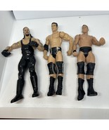 Lot of 3 WWE Wrestling Action Figures Undertaker Cody Rhodes Ted Dibiase... - £13.43 GBP