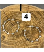 Sterling Silver Celestial Star Hoop Earrings - €32,69 EUR