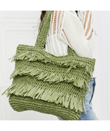 The Last Straw Fringe Straw Tote Bag. In olive - $60.90 CAD