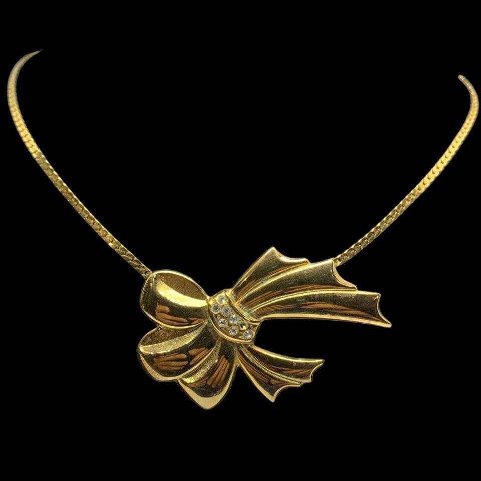 Vintage gold tone bow tie necklace 18” - $24.35