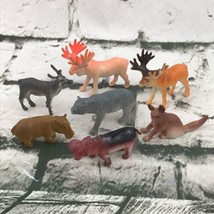 Miniature Animal Figures Lot Of 7 Plastic Toys Elk Bear Hippos Wolf  - £5.51 GBP