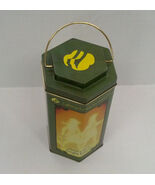 Girl scout lighting the way lantern shaped collectible tin container green - $362.29 MXN