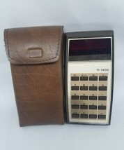Vintage Texas Instruments TI-1400 Calculator in Brown Case 1277 LTA - $48.68