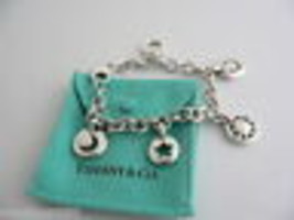 Tiffany &amp; Co Silver Heart Sun Star Moon Horseshoe Bracelet Stencil Charm Bangle - £476.91 GBP