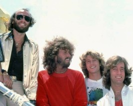 The Bee Gees rare of the four Gibb brothers smiling for cameras 11x17 poster - £15.94 GBP