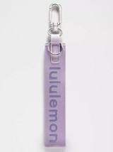 LULULEMON NEVER LOST KEYCHAIN~LAVENDER FROST/GALACTIC COBALT~NWT FREE US... - $1,019.83 MXN