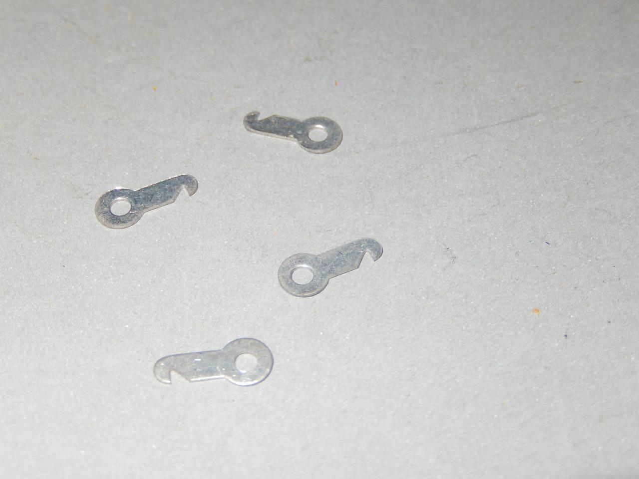 LIONEL PART - 2343-131 - SOLDER LUGS - 4 PIECES  -NEW - H35 - $1.09