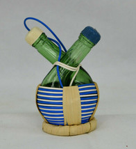 Vintage Glass Bottles In Plastic And Straw Basket Salt And Pepper Shakers - $12.30