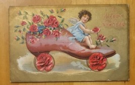 &quot;A Happy New Year&quot; - Angel Driving Red Shoe - 1907-1915 Embossed Post Card - £3.71 GBP