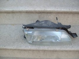 1995 1996 NISSAN MAXIMA RIGHT HEADLIGHT ORIGINAL USED - $142.21