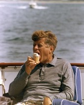 President John F. Kennedy eats ice cream on board the Honey Fitz New 8x10 Photo - $8.81