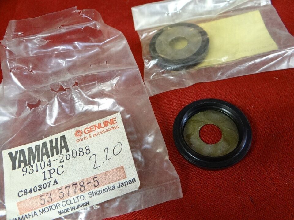 Primary image for 2 Yamaha Oil Seals, F Wheel, NOS 1985-86 YFM80 YF60 YFM200, 93104-26088-00