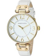 Anne Klein Women&#39;s 109168IVBN Gold-Tone and White Leather Strap Watch  -... - $372.21 MXN