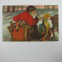 Vintage Christmas Postcard Santa Rides Sleigh Toys Snow Trees Embossed Antique - $19.99
