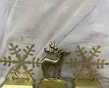 lot heavy brass Gold Snowflake and Reindeer Stocking Holders Mantle Chri... - $32.62