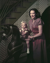 Linda Darnell with child on wooden rocking horse maroon dress 16x20 Canvas - £55.35 GBP