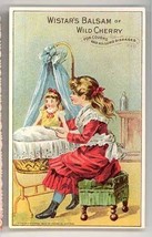 Wistar&#39;s balsam Wild Cherry Victorian trade card baby doll girl cradle medicine - £11.01 GBP