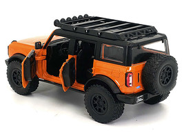 2021 Ford Bronco Orange with Black Stripes and Roof Rack "Just Trucks" Series 1/ - $1,714.85 MXN