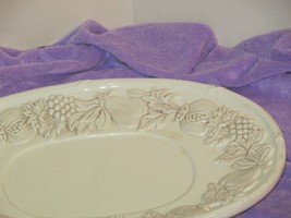 oval cream colored PLATE w/1.5" rim of raised fruits G GIBSON USA ELITE (hall G) - $11.88