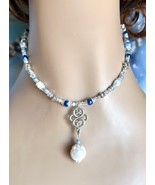 Pure Elegance: Ocean Inspired White Shell Drop Pearl Framed In Blue And ... - $25.25