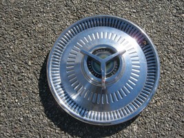 One genuine 1964 Ford Fairlane Sports Coupe 14 inch spinner hubcap wheel... - $37.05