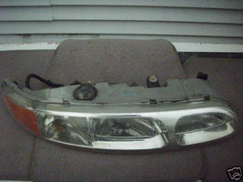 2004 2003 2002 OLDSMOBILE ALERO RIGHT HEADLIGHT OEM USED - $133.80