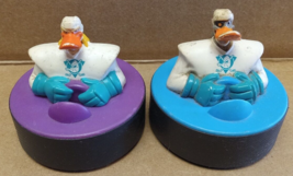 2 Disney Mighty Duck Hockey Pucks 1997 McDonalds Purple 33 &amp; Blue 13 - £4.71 GBP