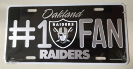 Oakland Raiders #1 Fan Metal License Plate - $199.04 MXN