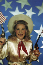 Betty Hutton in Annie Get Your Gun classic pose with American flag and guns24x18 - £19.29 GBP