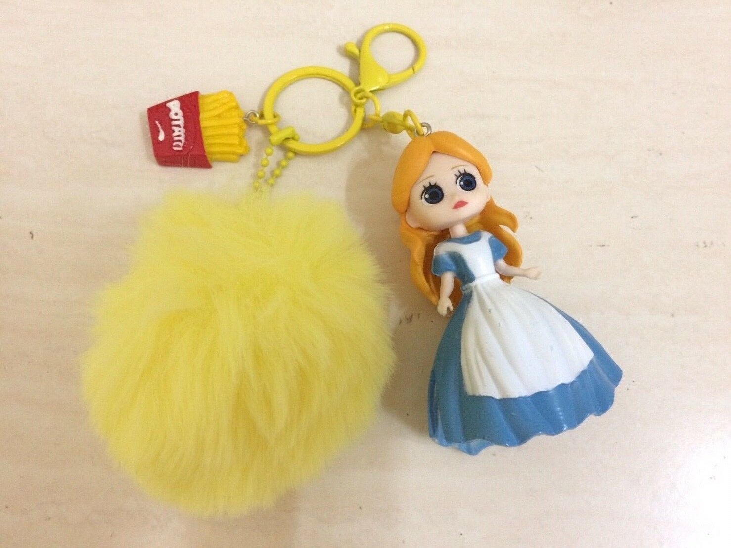 Primary image for Disney Alice in Wonderland Keychain with Pom Pom. Sweet Theme. Rare item