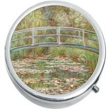 Monet Bridge Flowers Medicine Vitamin Pill Box - $11.65