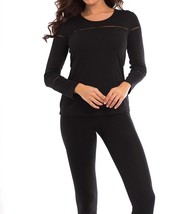 Angel wrinkle free cutout tunic in Black - $52.00