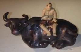 Ceramic Figure Man Sitting On Sitting Buffalo Large - $12.95