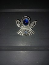 vintage KC faux Blue cabachon Blue stone angel pin - $146.11 MXN