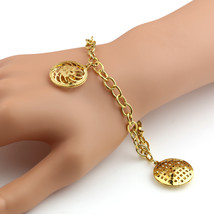 Gold Tone Bracelet With Open Cut Out Designed Charms - $19.99