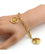 Gold Tone Bracelet With Open Cut Out Designed Charms - $19.99