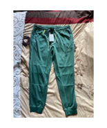 Nike Sportwear Jersey Pants Wash Revival Size: Large Color: Galactic Jade - $130.98 CAD