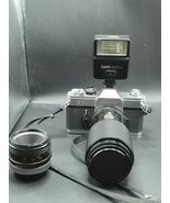Canon FT QL 35mm Film Camera Kit w/ FD 50mm f/1.8, FD 70–210mm f/4 Zoom ... - $3,638.30 MXN