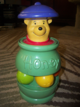 vintage winnie the pooh toy push down and it pops up after a spin. - £11.98 GBP