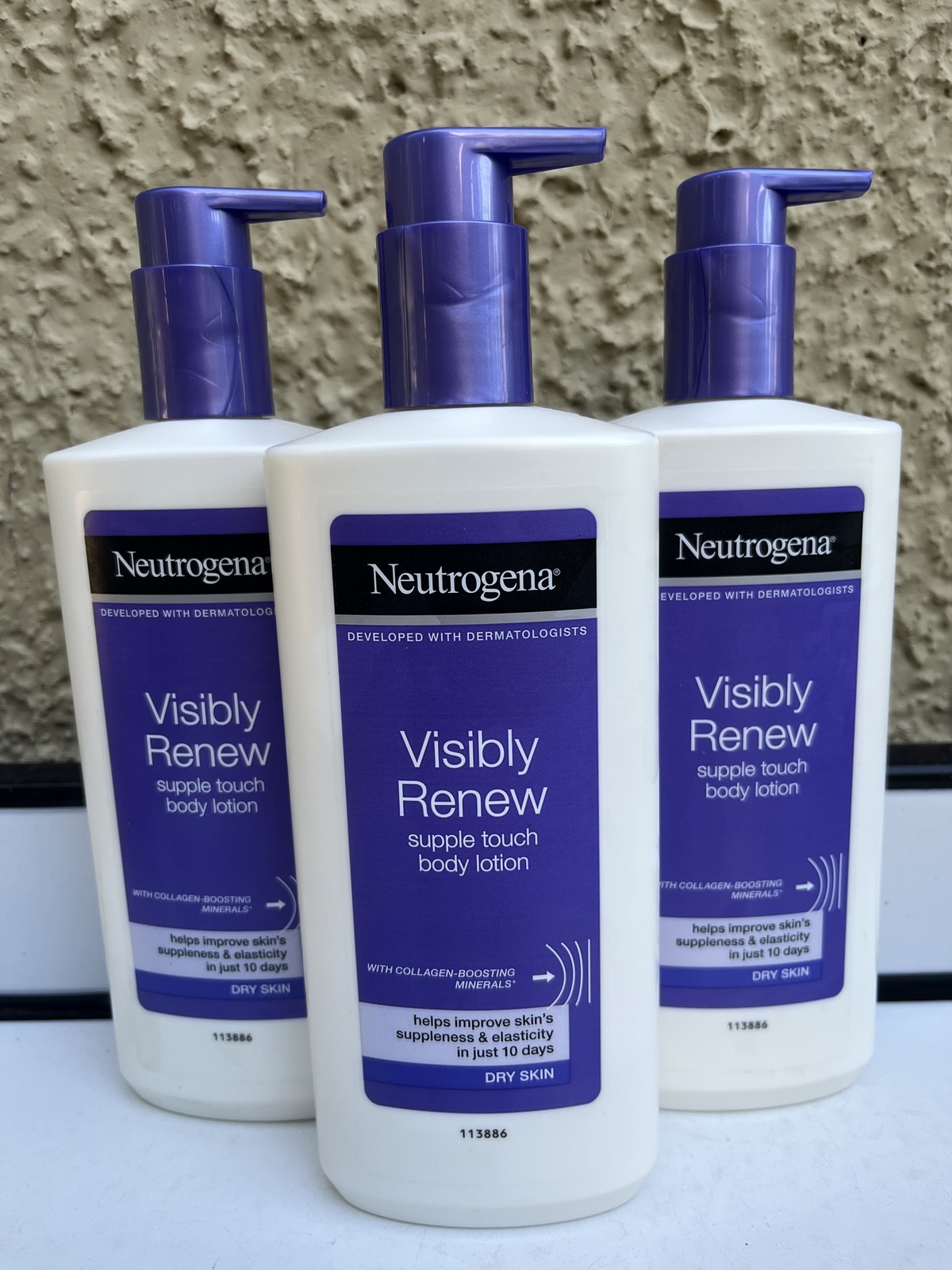 Primary image for (3) Neutrogena Visibly Renew Supple Touch Body Lotion Dry Skin With Pump 13.5 Oz
