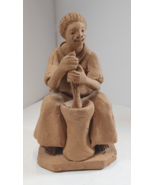 Vintage clay figure from Brazil, depicting a person using a mortar and p... - $604.97 MXN