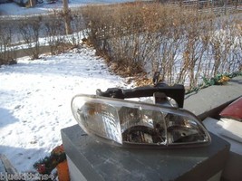 1996 1997 1998 PONTIAC GRAND AM RIGHT HEADLIGHT OEM - $1,759.08 MXN
