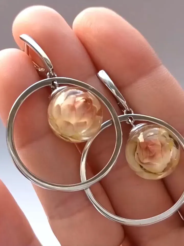 Silver earrings with helichrysums - $119.00