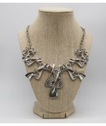 Silver tone abstract modernist bib necklace with white rhinestone accents - $24.99