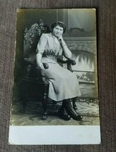 Photo postcard c1910 Young Woman Chair Pose Fireplace Boots Menomonee Fa... - £7.66 GBP