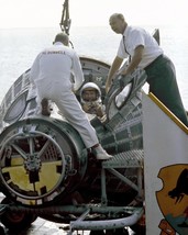 Wally Schirra climbs out of Gemini 6A capsule after splashdown Photo Print - £7.08 GBP