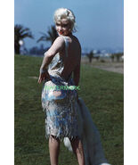 MARILYN MONROE POSING ON THE SET OF SOME LIKE IT HOT PUBLICITY PHOTO 8X10 - $9.89